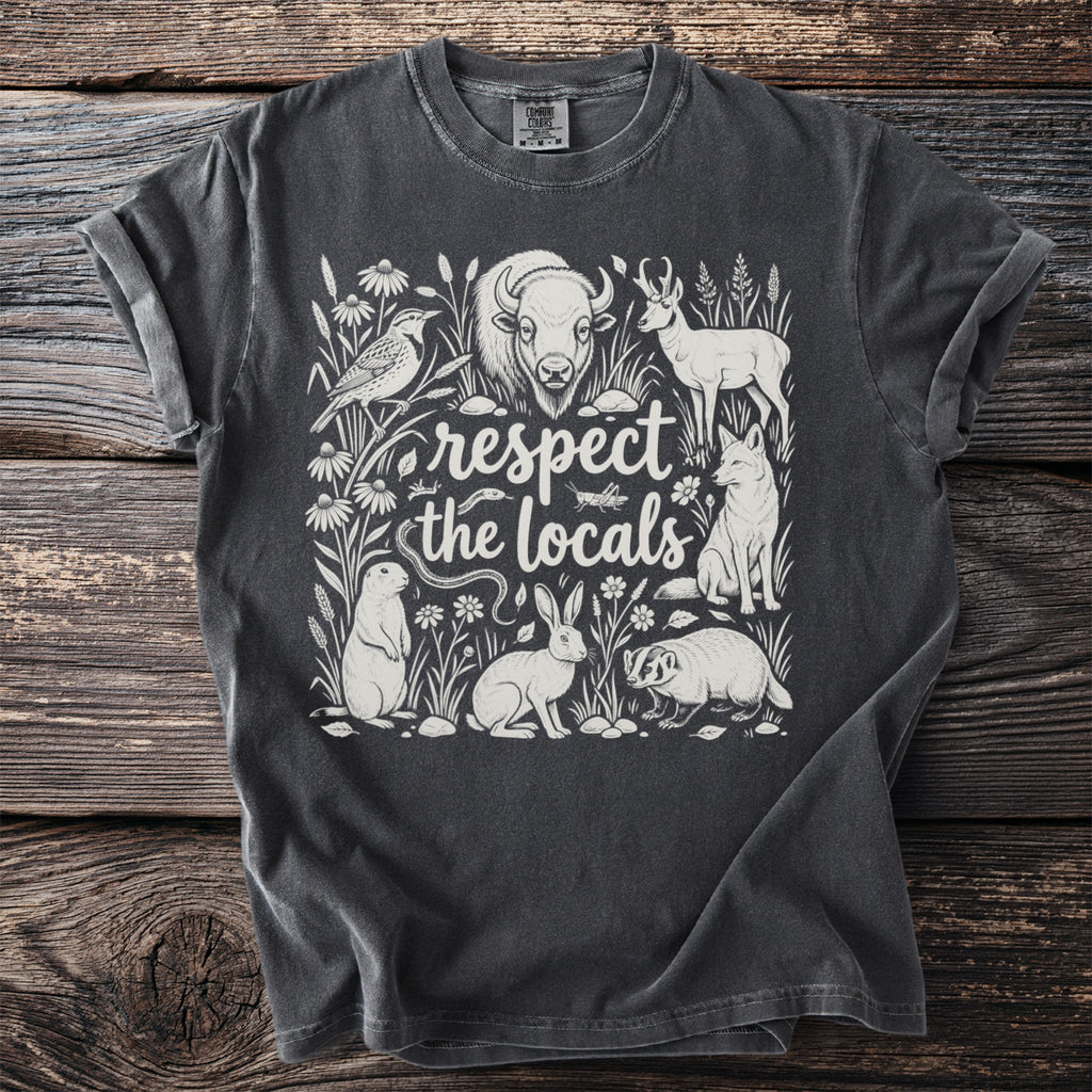 T-shirt with "respect the locals" text and illustrations of North American wildlife.