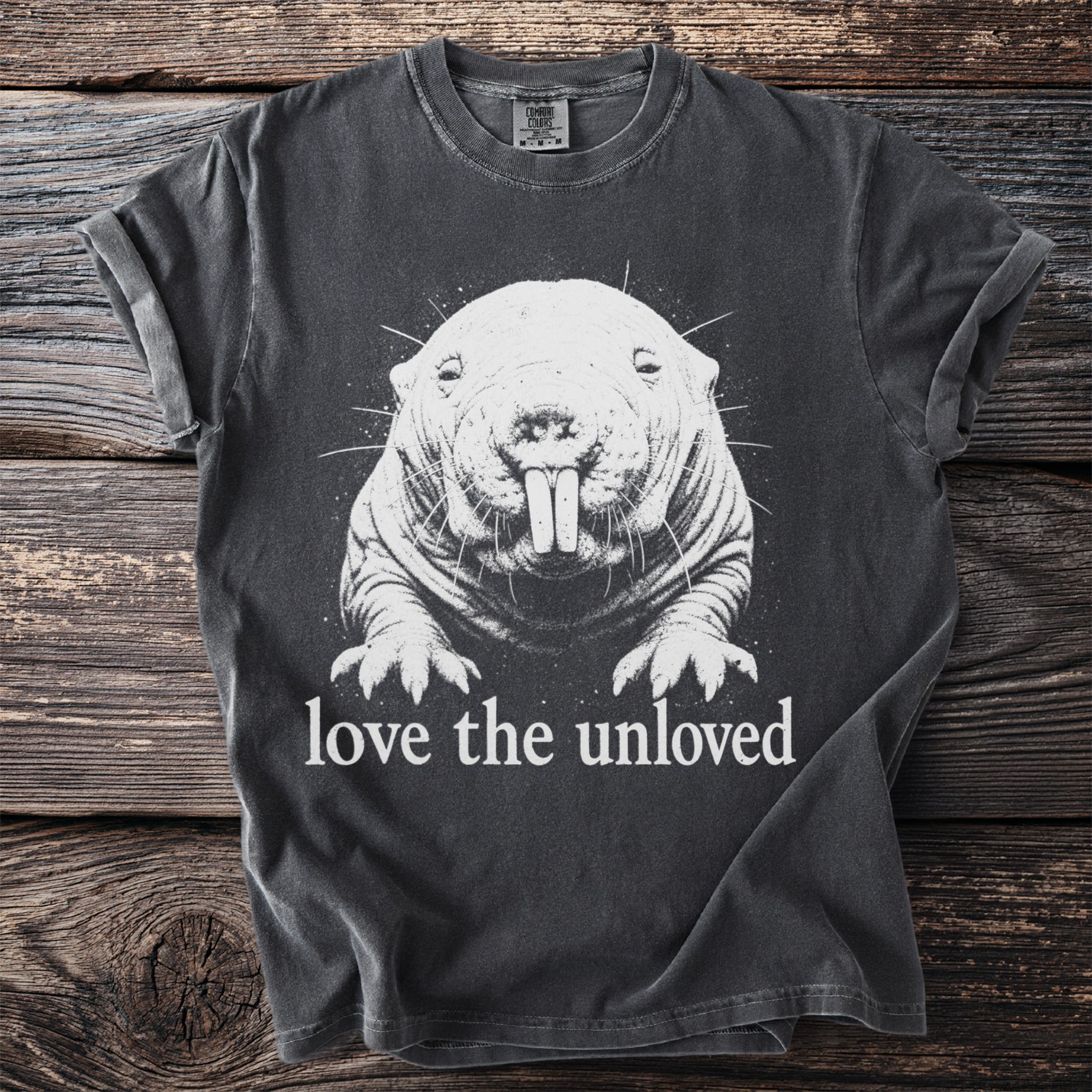 Gray t-shirt with a white drawing of a naked mole-rat and text "love the unloved".
