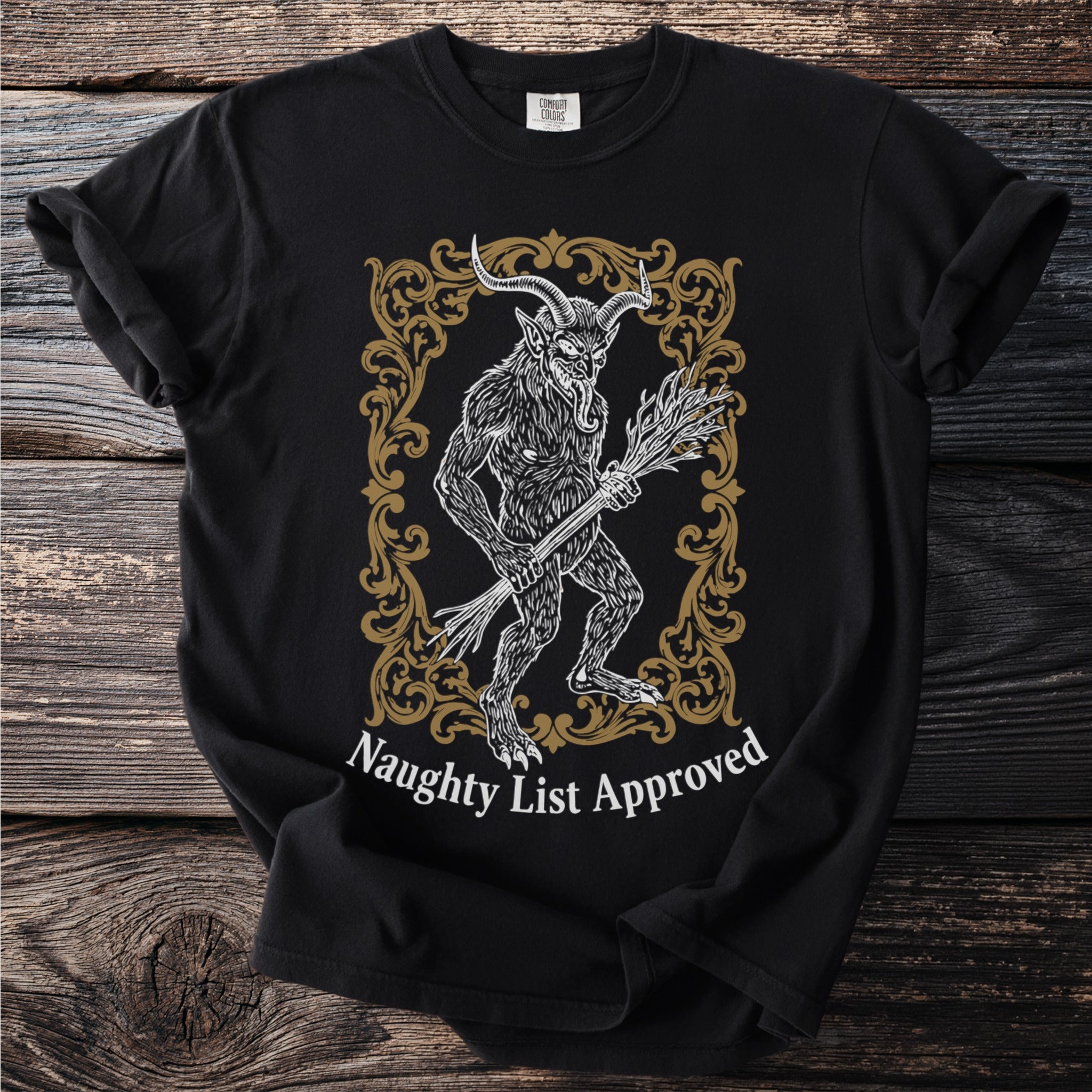 Black t-shirt with Krampus illustration and "Naughty List Approved" text.
