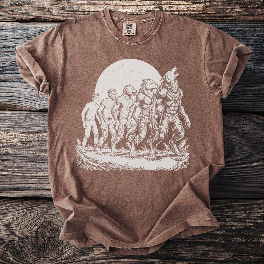 Brown t-shirt featuring a werewolf transformation sequence under a full moon.