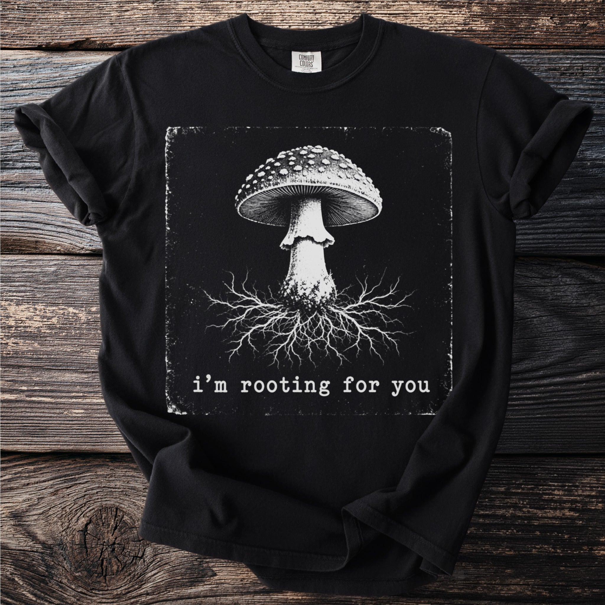 Black t-shirt with a distressed graphic of a mushroom and roots, and text "i'm rooting for you".