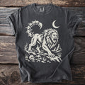 Dark t-shirt with graphic of a lion-scorpion hybrid, moon, and skull.