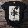 A tall figure with tentacles stands on a stage before an audience.