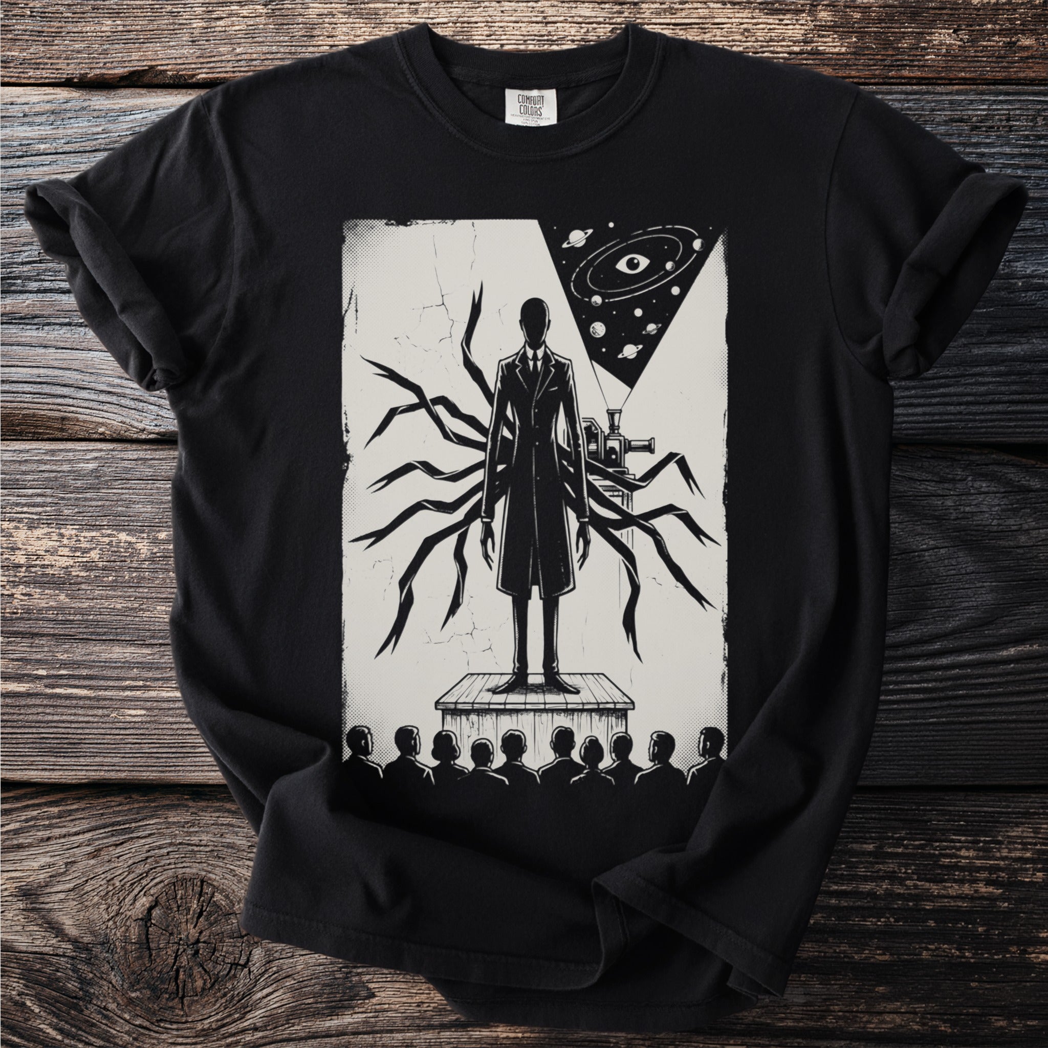 A tall figure with tentacles stands on a stage before an audience.