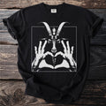 Black t-shirt with a white graphic of a goat's head framed by hands forming a heart.