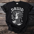 Black t-shirt with "DRUID" text and a linocut-style illustration of a druid.