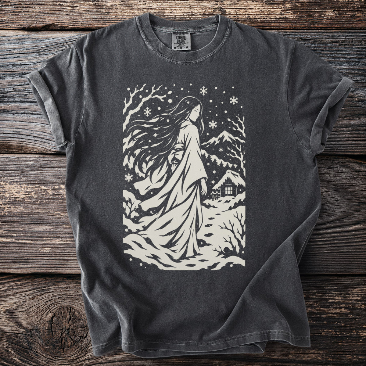 T-shirt with a winter scene featuring a woman in a kimono and snowflakes.