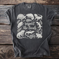 Dark grey t-shirt with white illustration of assorted reptiles and amphibians and text.