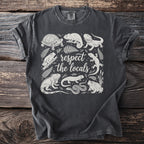 Dark grey t-shirt with white illustration of assorted reptiles and amphibians and text.