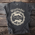 Dark grey t-shirt with "Wayfinder" and circular graphic of two running hares.