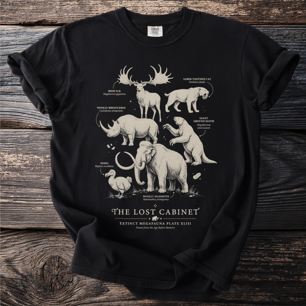 Black t-shirt with extinct megafauna illustrations: Irish elk, woolly rhinoceros, dodo, saber-toothed cat, ground sloth, woolly mammoth.
