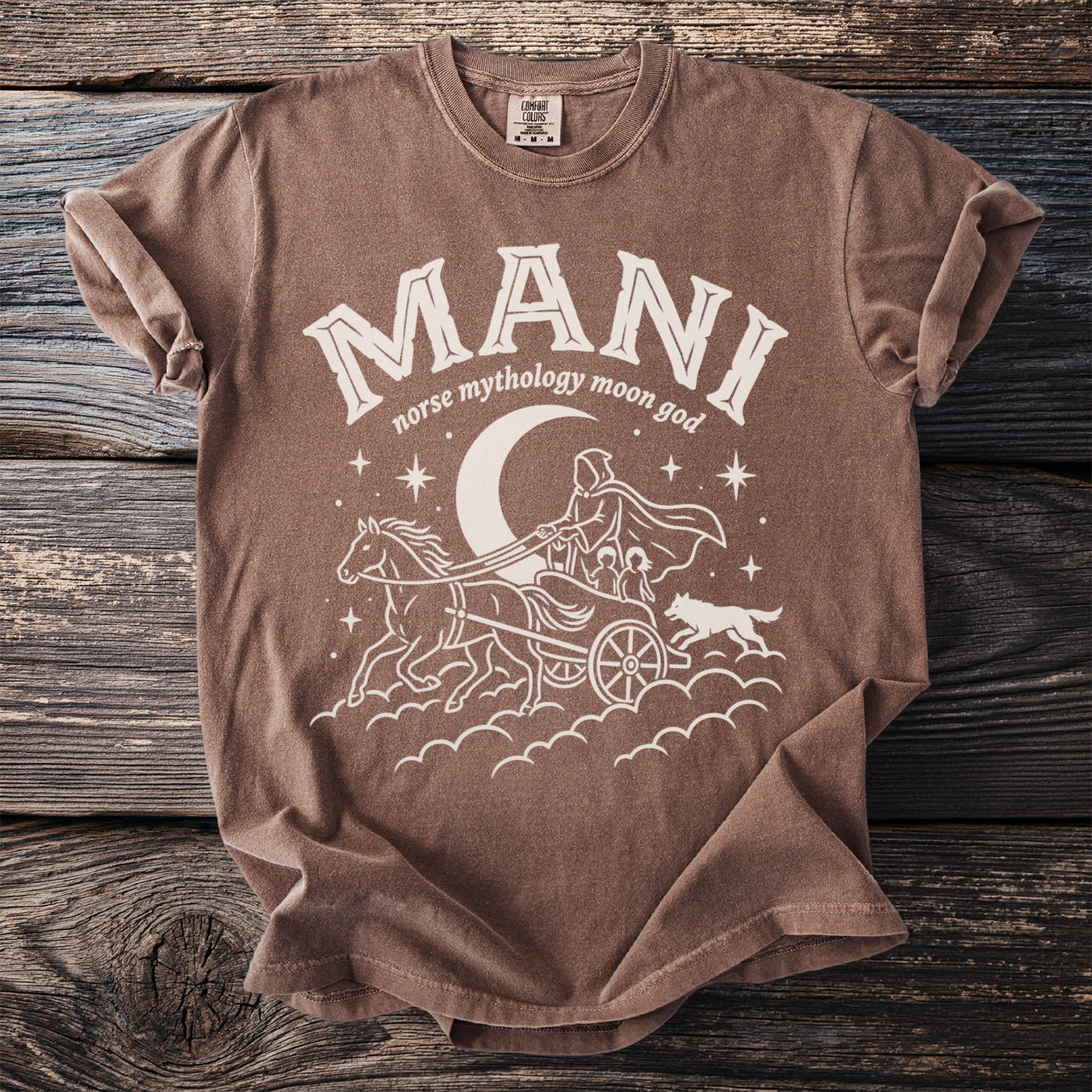 Brown t-shirt with "MANI norse mythology moon god" text and moon chariot graphic.