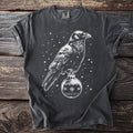 Dark t-shirt with white crow perched on a snowflake ornament design.