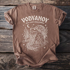Brown t-shirt with white VODYANOY Slavic water demon folklore graphic.