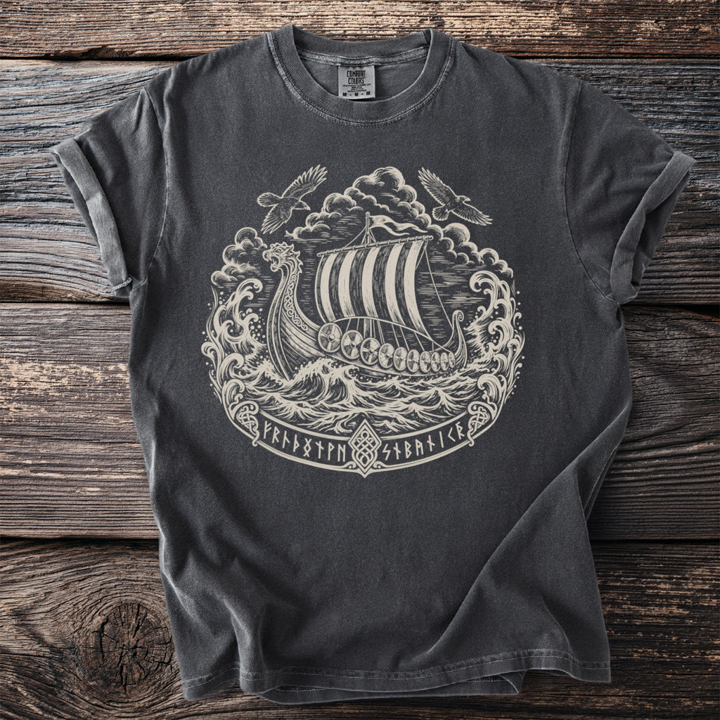 Dark t-shirt with a circular Viking ship design, two eagles, and runes.