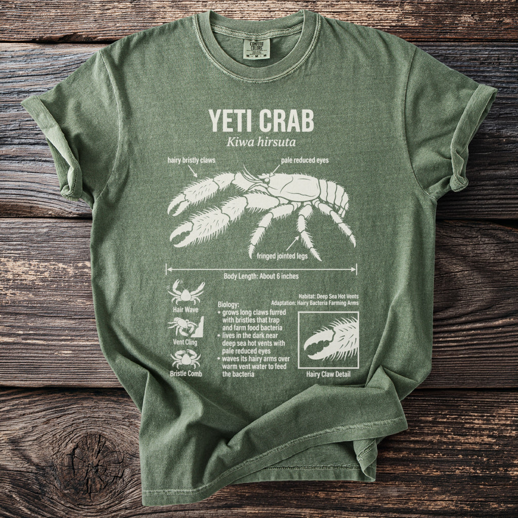 Green t-shirt with a white diagram of the Yeti Crab and its biological facts.
