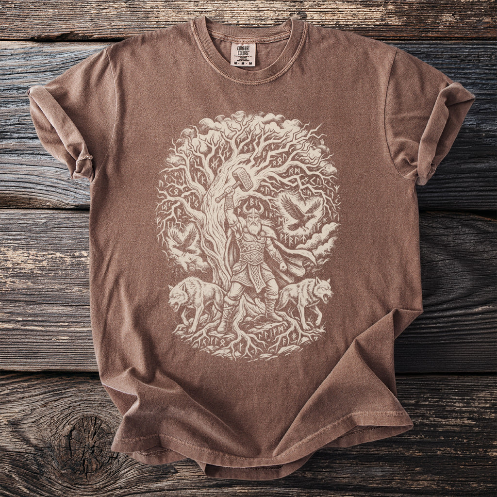 Brown t-shirt with an intricate line drawing of Thor, Mjolnir, world tree, wolves, and ravens.
