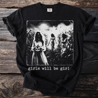 T-shirt graphic shows three ghostly figures in a cornfield with text "girls will be girl".