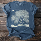 Blue t-shirt with a sketched willow tree, moon, and hanging lanterns.
