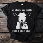 Black t-shirt with a goat eating a sprig and text "all plants are edible some only once".