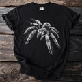 Black t-shirt with a detailed white tarantula graphic and "COMFORT COLORS" label.