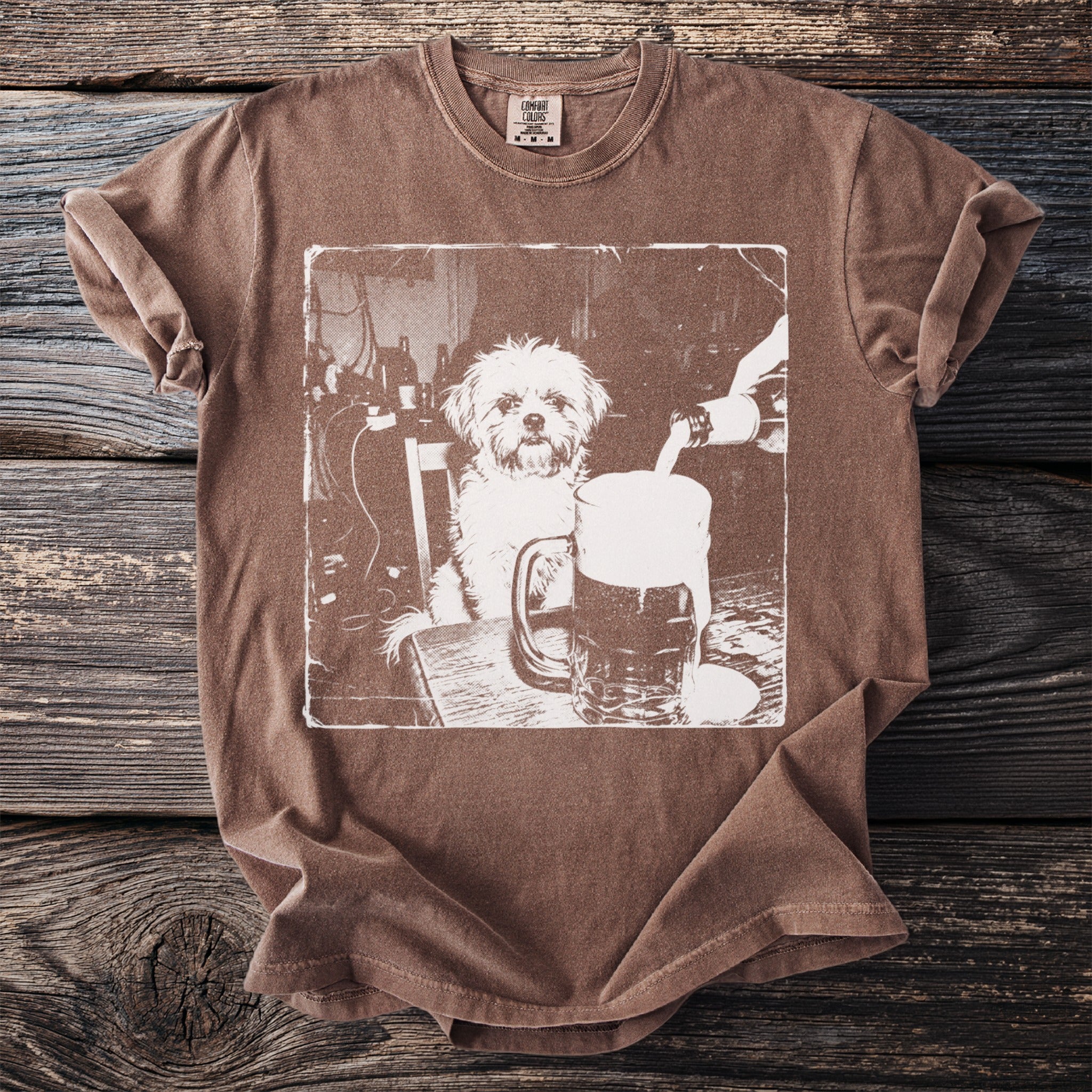 Brown t-shirt with a graphic of a dog and a overflowing beer mug.