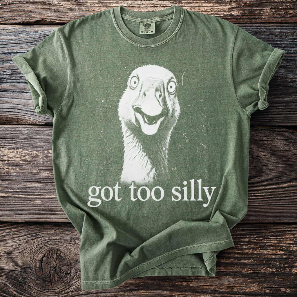 Green Comfort Colors t-shirt with a distressed graphic of a goose and the text "got too silly".