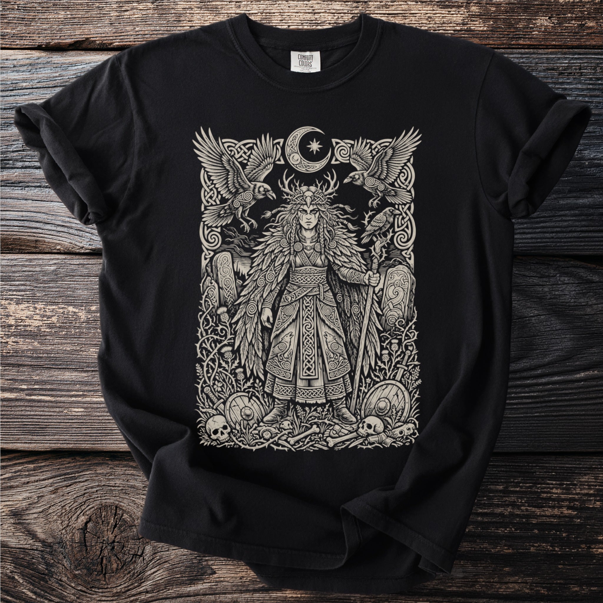 Black t-shirt with Norse-inspired graphic of a warrior, ravens, moon, and shields.