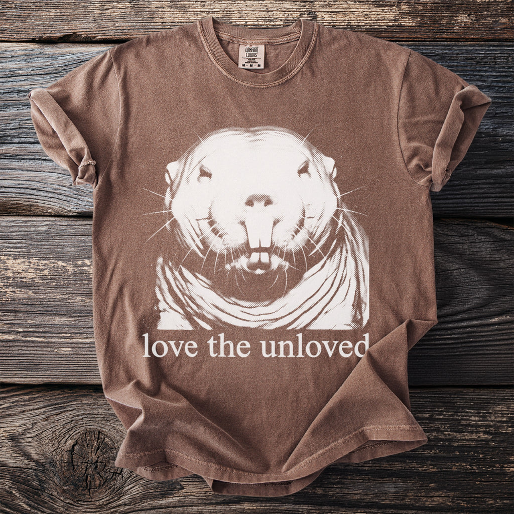 Brown t-shirt with white rodent graphic and text "love the unloved."