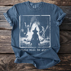 T-shirt with witches around a bonfire and "girls will be girls" text.