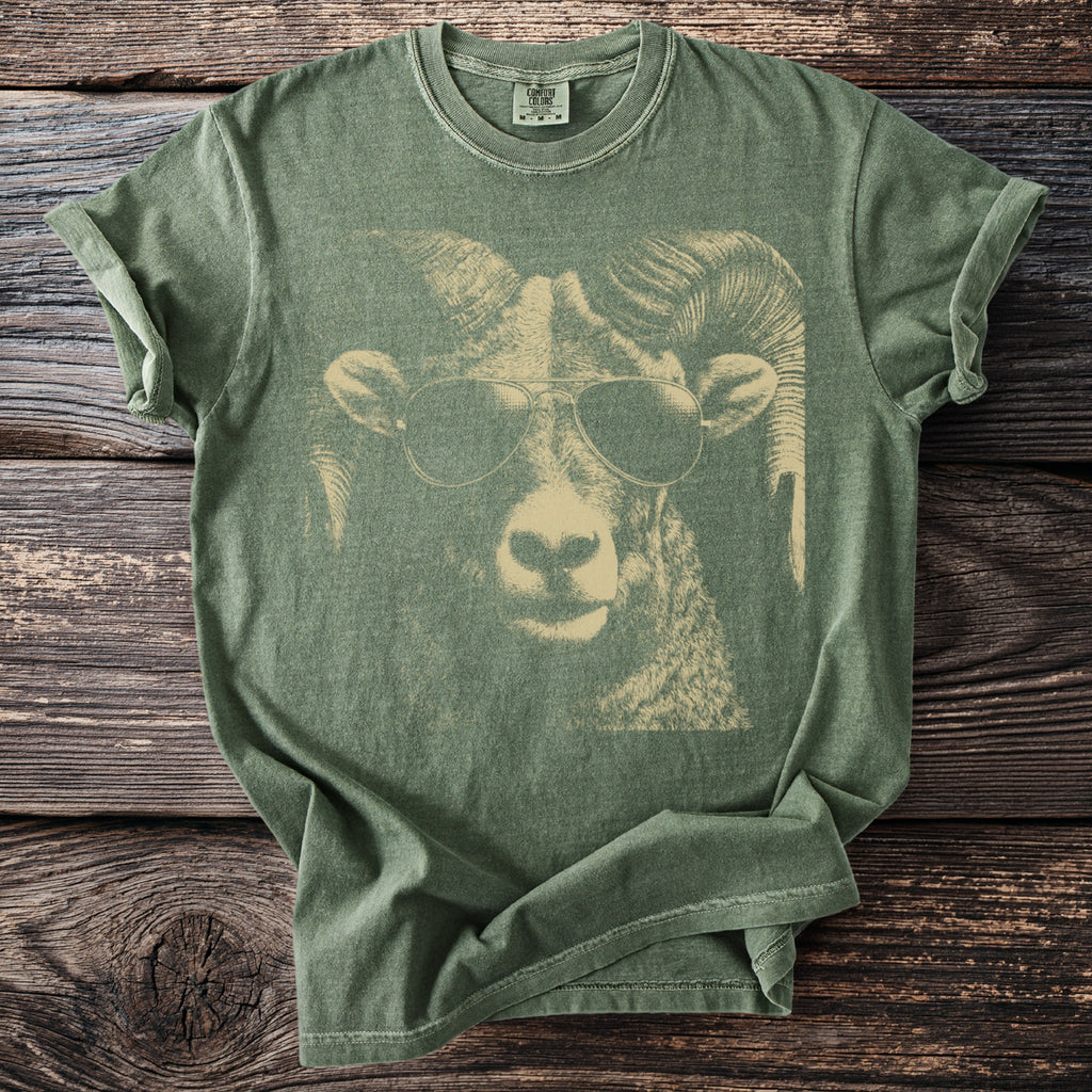 Green t-shirt with a ram wearing aviator sunglasses graphic.