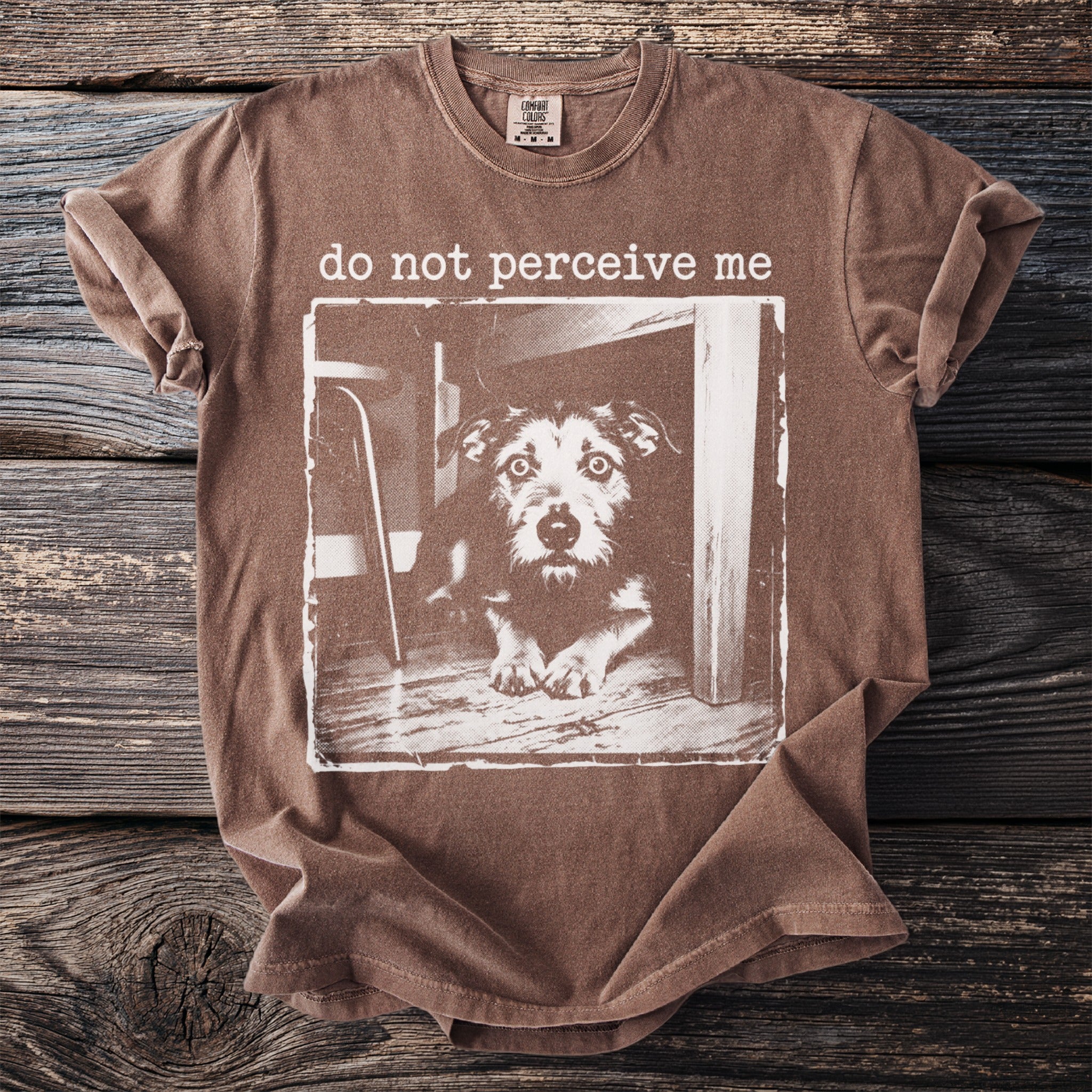 Brown t-shirt with a distressed graphic of a dog and text "do not perceive me".