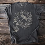 Dark gray t-shirt with a line art print of a dragonfly and dandelions.