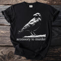 Black t-shirt with a crow graphic and text "accessory to murder"
