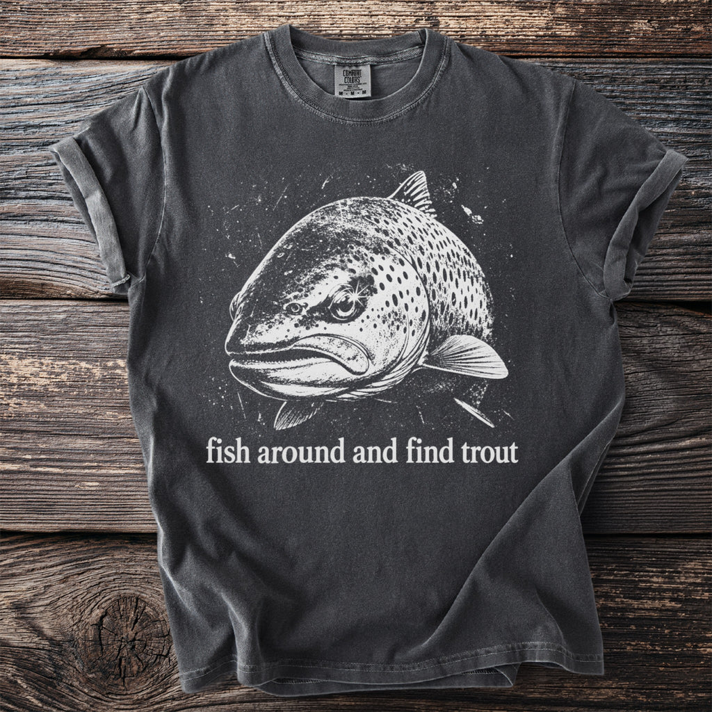 Dark t-shirt with white trout graphic and text "fish around and find trout".