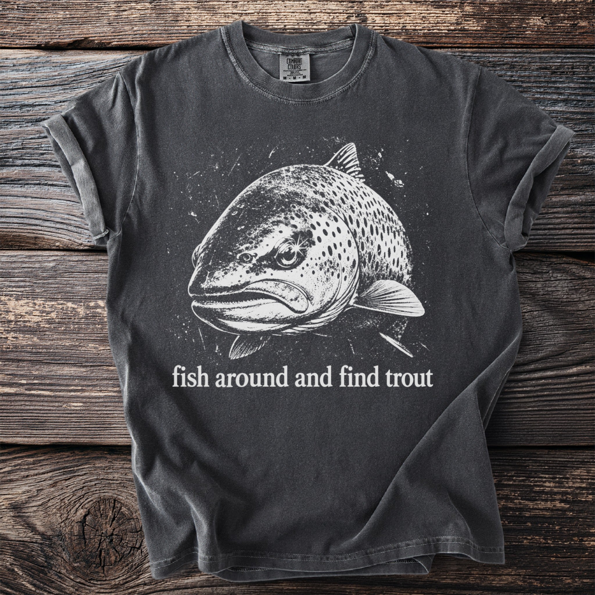 Dark t-shirt with white trout graphic and text "fish around and find trout".