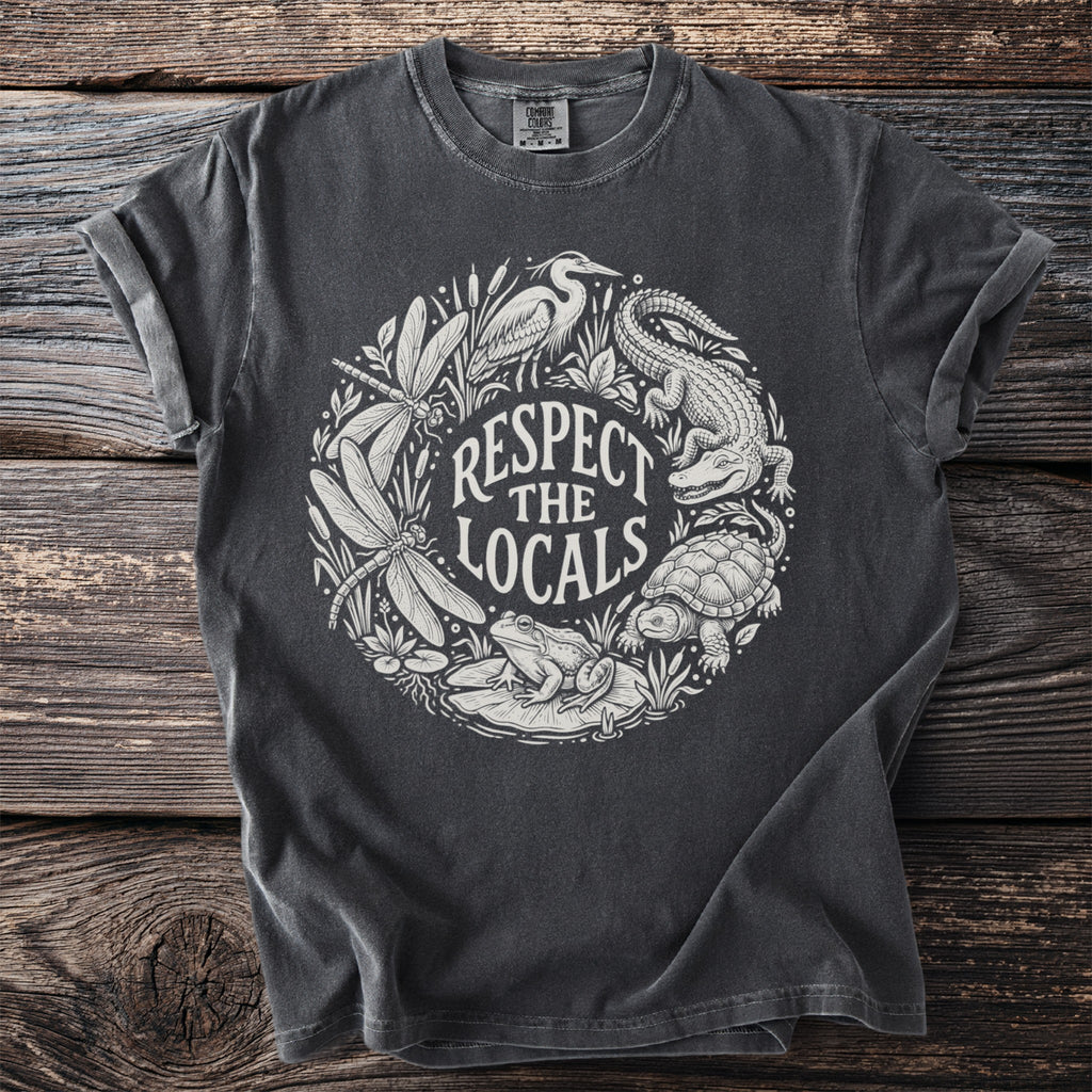 Dark grey t-shirt with white circular wildlife graphic and text "Respect The Locals".