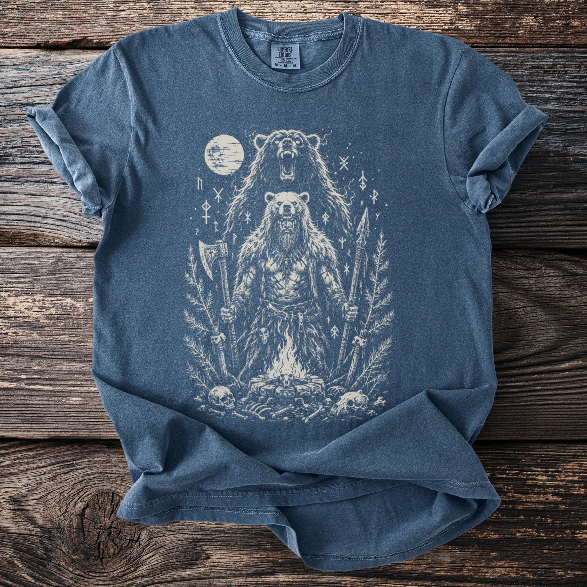 Blue t-shirt with a distressed print of a warrior bear and a roaring bear, moon, campfire, and runes.