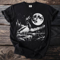 Black t-shirt with graphic of ducks by a moonlit lake with forest and mountains.