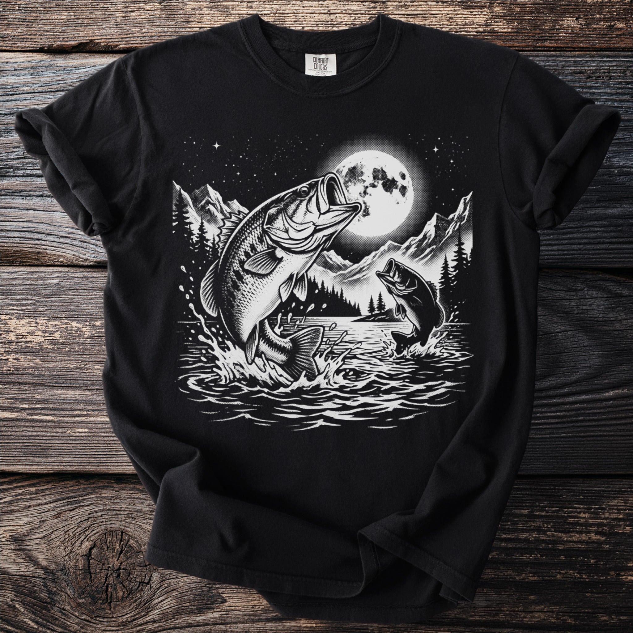Black t-shirt with a graphic of bass fish jumping near a full moon.