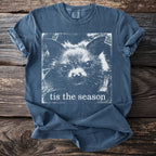 Blue t-shirt with a white bat face graphic and text "tis the season".