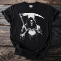 Grim Reaper with scythe makes heart shape with hands on black t-shirt.