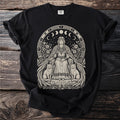 Black t-shirt with a beige Norse goddess sitting with two cats and celestial moon phases.