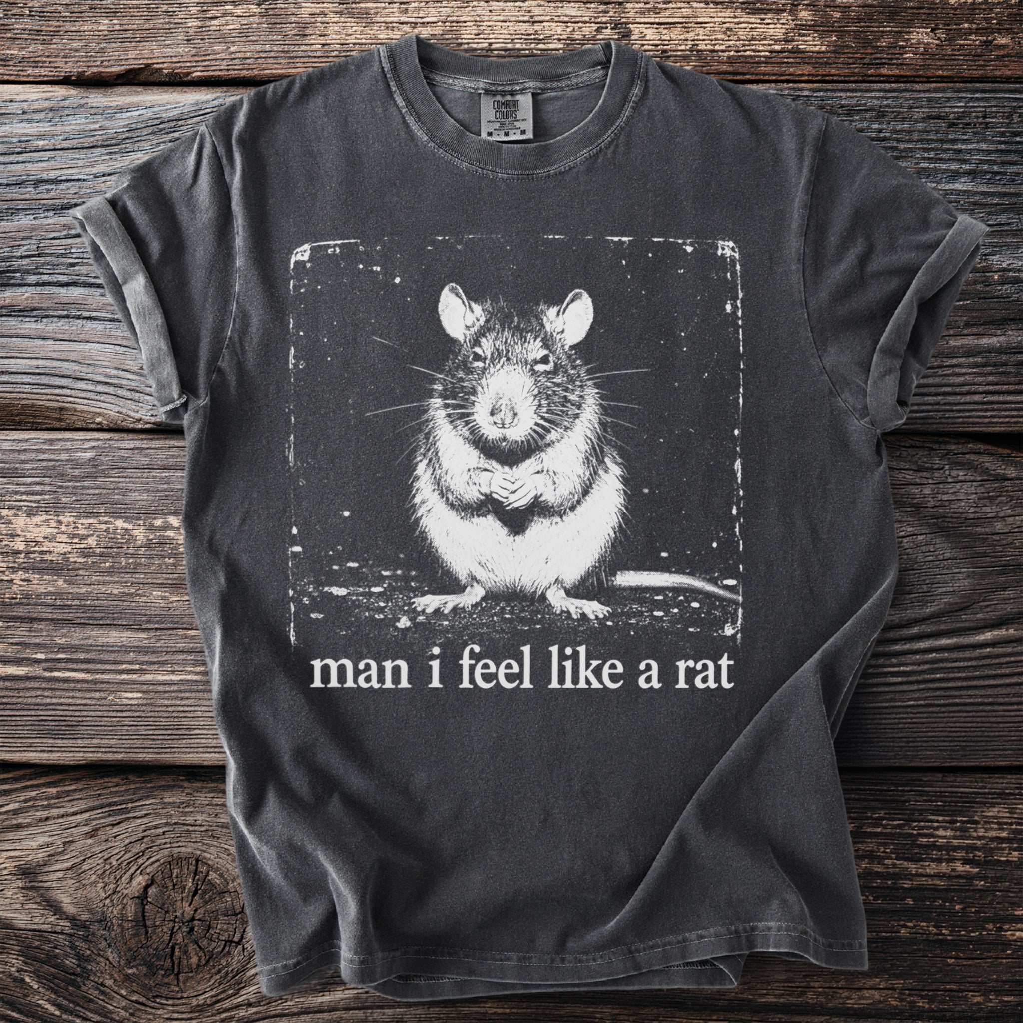 Dark gray t-shirt with a distressed graphic of a rat and the text "man i feel like a rat".