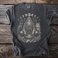 T-shirt features a seated wizard with a raven, wolf, and moon phases graphic.