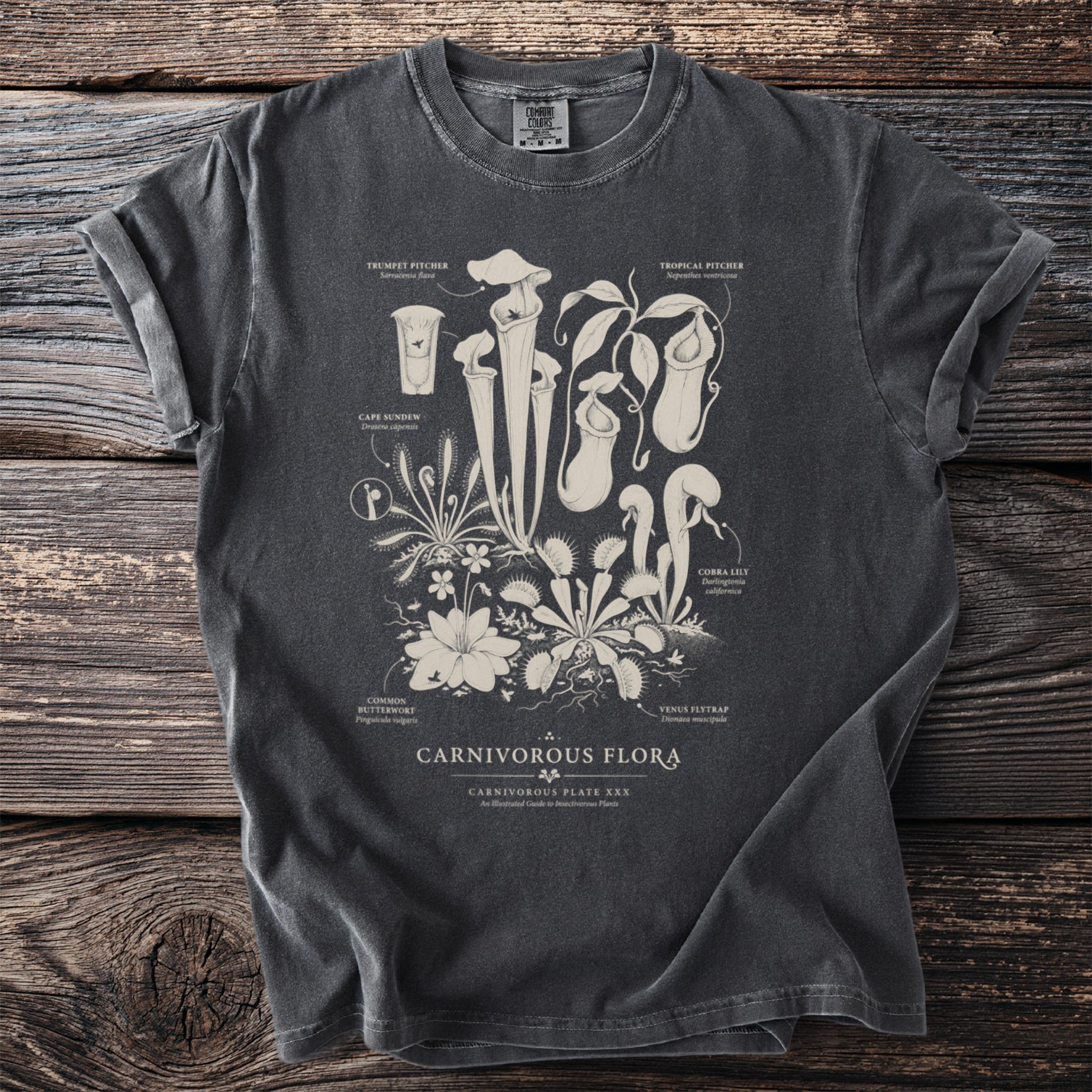 T-shirt with botanical illustrations of carnivorous plants titled "Carnivorous Flora".