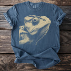 Blue t-shirt with a tan distressed print of a lizard's head.