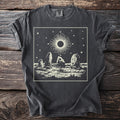 Dark gray t-shirt with cream circular sun and standing stones graphic.