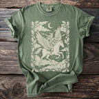 Green t-shirt with a winged female warrior riding a horse, framed by oak leaves.