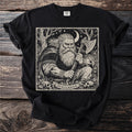 Berserker viking with axe and skulls artwork on a black t-shirt.